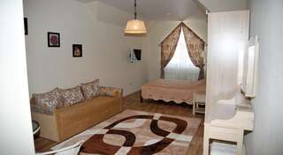 Гостиница Komplex Derbi Пятигорск Номер-студио с кроватью размера "king-size" и диван-кроватью-7